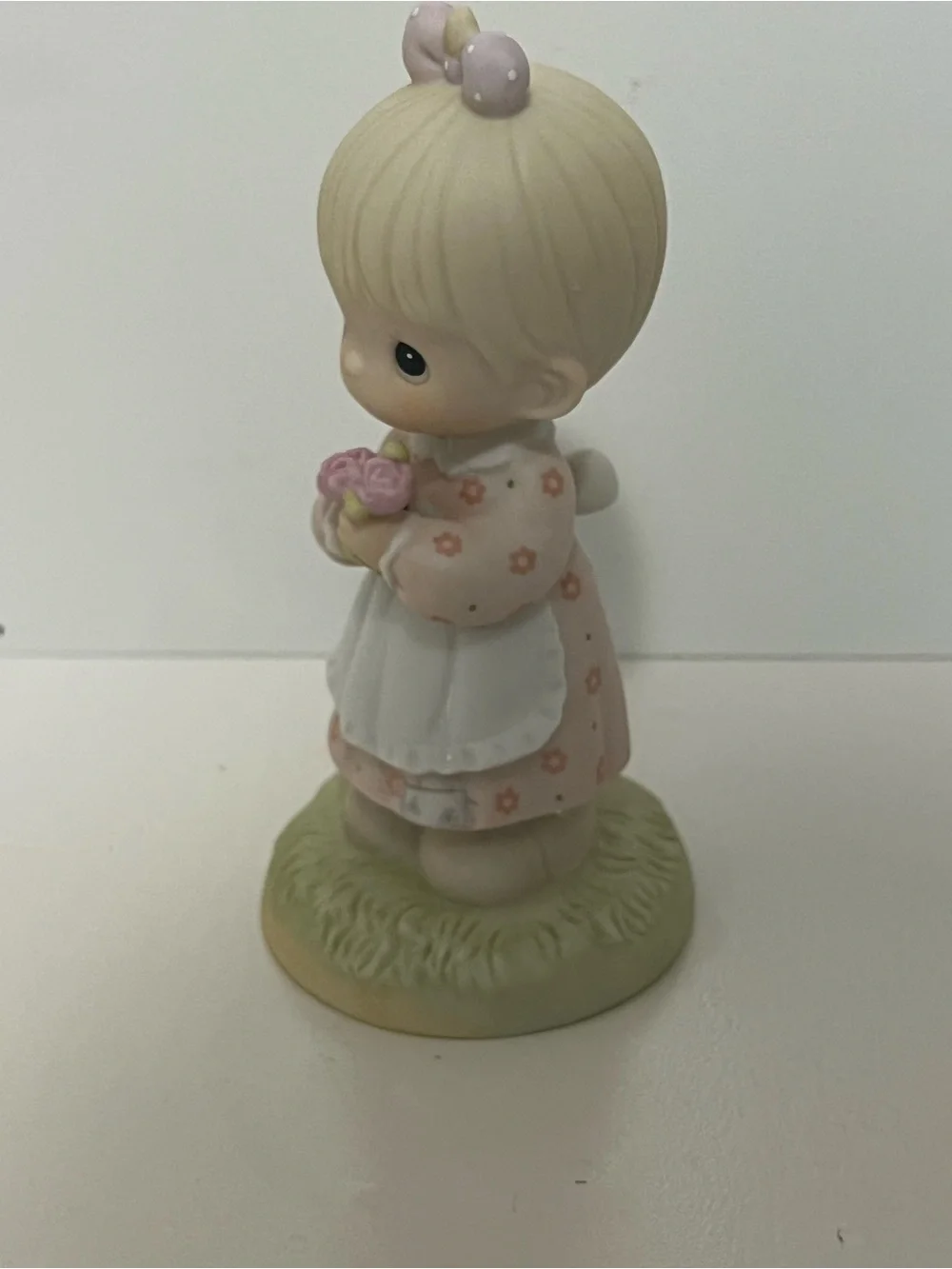 Vintage Precious Moments figurine titled “Mommy I Love You” from 1987